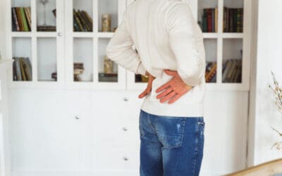 Is lower back pain when standing normal? What causes this?